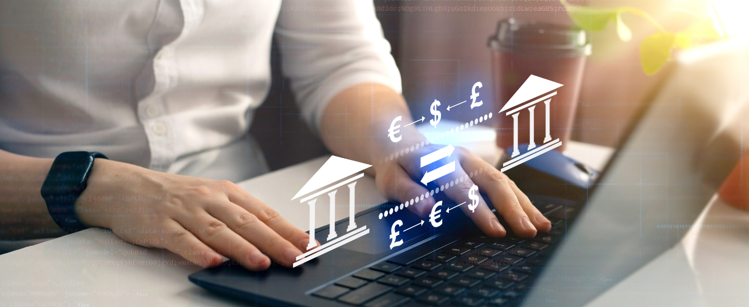 Person arbeitet am Laptop, darüber eingeblendete Symbole von Banken und Währungen als Visualisierung digitaler Finanz- und Zahlungsprozesse.