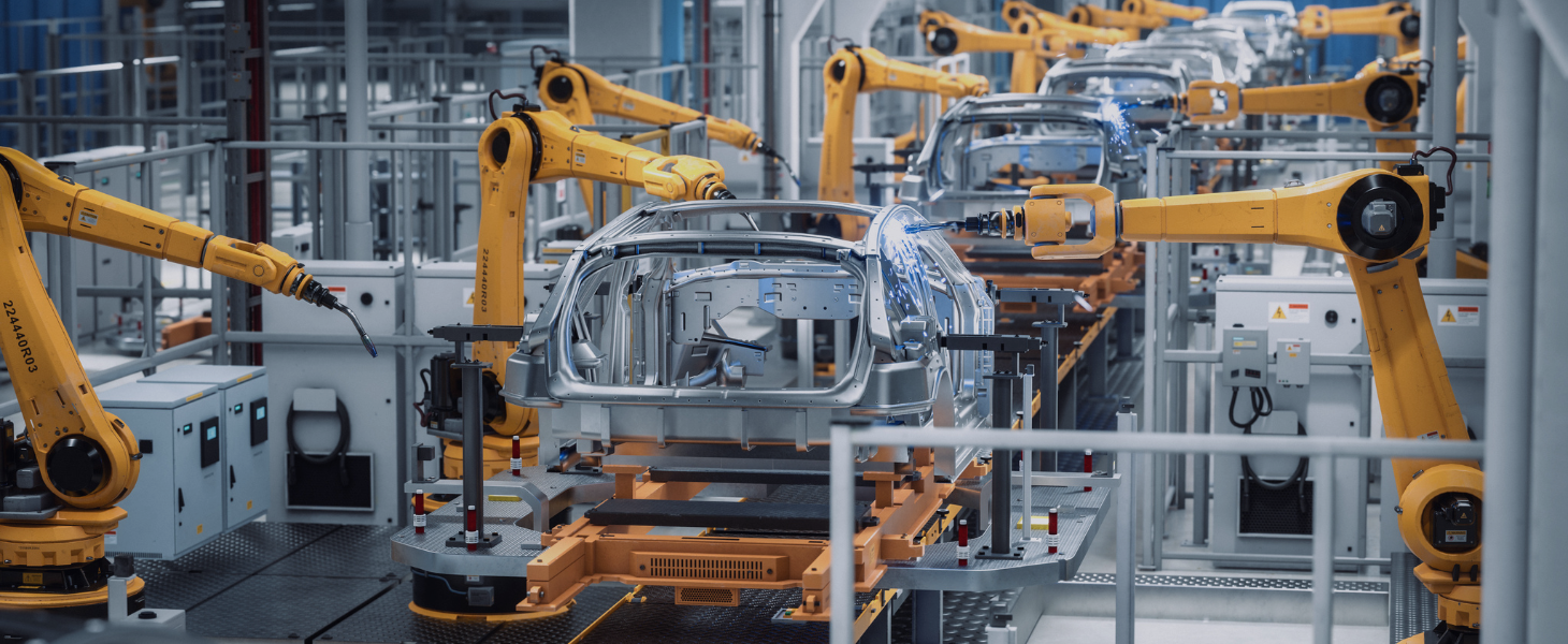 Industrieroboter montieren eine Fahrzeugkarosserie in der Fabrik, symbolisch für Catena-X